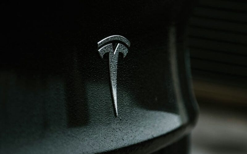 black and gray nike logo