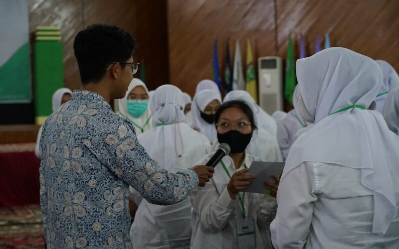 a group of people in white lab coats