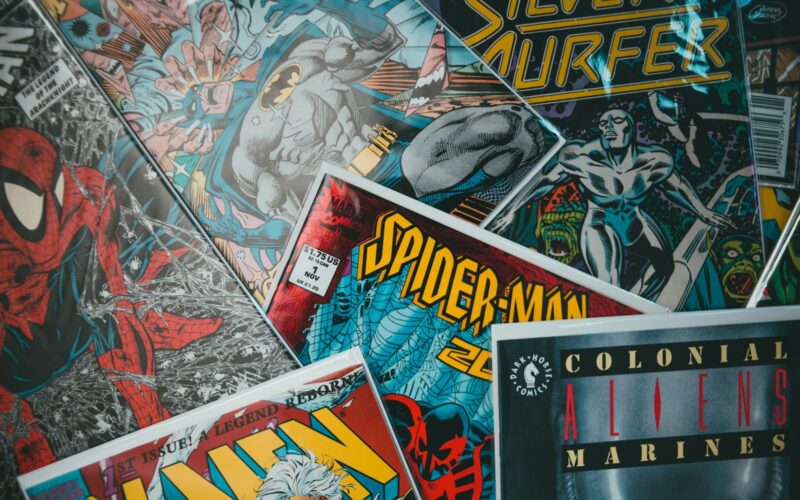 a pile of comics sitting next to each other