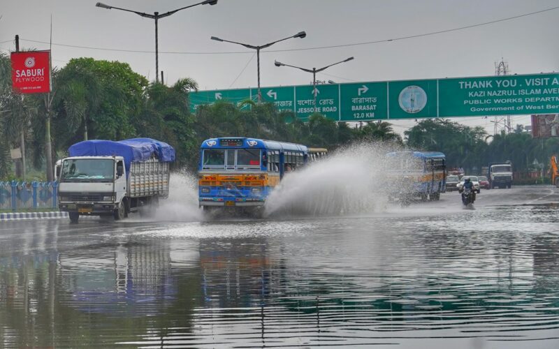 a bus driving down a street